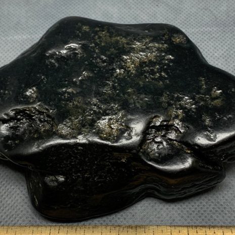 Wyoming black nephrite jade river cobble from the N. Platte River.