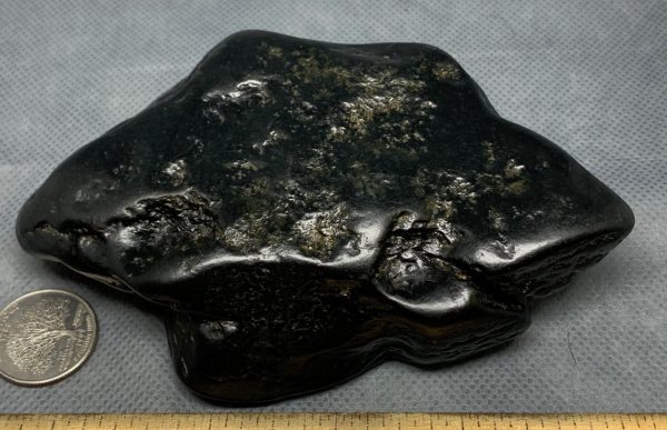 Wyoming black nephrite jade river cobble from the N. Platte River.