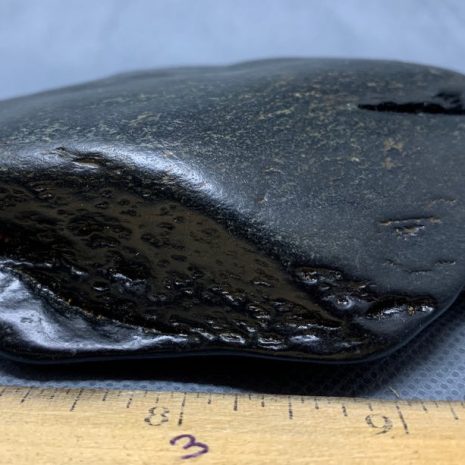 Wyoming black nephrite jade river cobble from the N. Platte River.