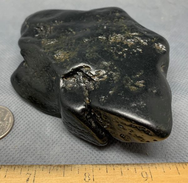 Wyoming black nephrite jade river cobble from the N. Platte River.