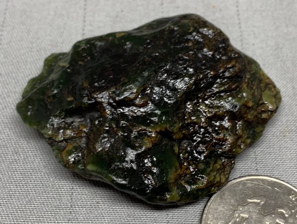 Bull Canyon Wyoming nephrite jade wind slicked specimens - light olive/apple