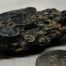 Dark Emerald Cinder nugget of Wyoming nephrite jade with crystal pockets