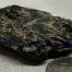 Dark Emerald Cinder nugget of Wyoming nephrite jade with crystal pockets