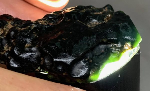 Dark Emerald Cinder nugget of Wyoming nephrite jade with crystal pockets