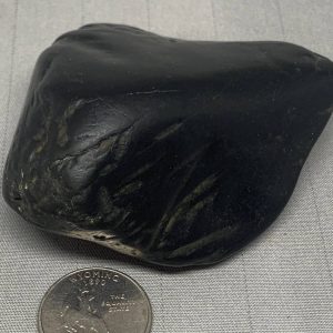 Wyoming black nephrite jade river cobble from the N. Platte River w/crystals