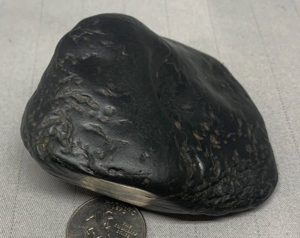 Wyoming black nephrite jade river cobble from the N. Platte River w/crystals