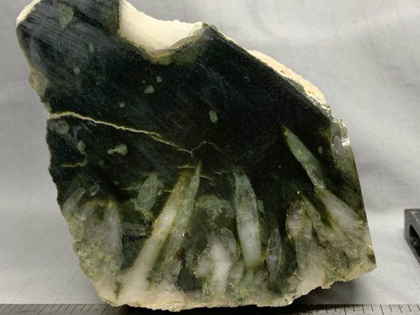 Wyoming dark olive nephrite jade with quartz crystals in cut block NQ-2