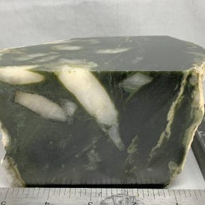 Wyoming dark olive nephrite jade with quartz crystals in cut block NQ-1