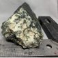 Wyoming dark olive nephrite jade with quartz crystals wind slick