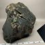 Dark Olive Nephrite w/quartz crystals Windslick cut bottom